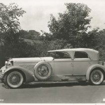 (1081) 1931 Duesenberg J-446 Car 2465 along fence row in a rural setting