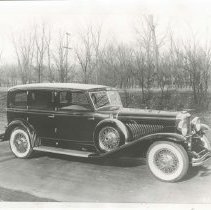 (1091)1933 Duesenberg J-520 Car 2547 in a rural, wooded setting