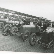 Four 1920s Duesenberg Racers with drivers and group of men, Uniontown, PA
