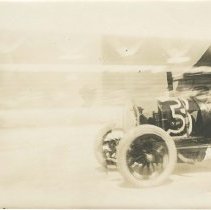 (136)Shot of a race car #3, possibly a Fiat, around 1915, in motion