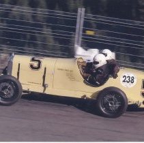 (18-4)Eight shots of Duesenberg Race Car #5, at a race track in Switzerland