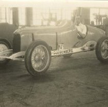 (46)1927 Duesenberg Race Car,man in car, at the Duesenberg, Inc., plant