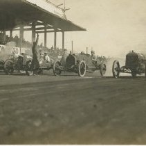 (50)Circa 1915 Case, Mercer, and Duesenberg #2 Race Cars at the race track