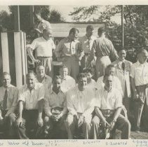 (64)Several former race car drivers gathered for a group photo in the 1950s