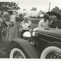 Shot of 1930 Duesenberg J at ACD Club Reunion with people gathered around