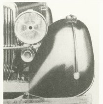 Detailed shot of left fender & headlight of Duesenberg J-585
