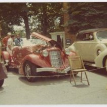 Auburn speedster Replica at Car show with its hood open