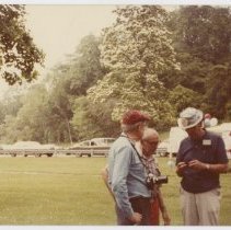 3 unidentified spectators at a show