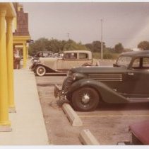 1936 Auburn 654 brougham in front of a 1931/1932 Auburn brougham
