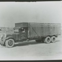 "Steward - A. Yoshimine No. 1 Santa Maria" truck with telephone lines faded out in background.