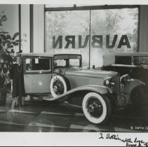Black and white image of Cord L-29 Brougham inside Auburn Cord Duesenberg Automobile Museum.