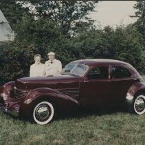 Colored image of Cord 810-812 Sedan on grass