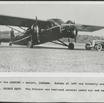 "Nostalgia at the Airport." Stinson aircraft between Auburn Sedan owned by "George Raft" and Cord L -29 Cabriolet on grass