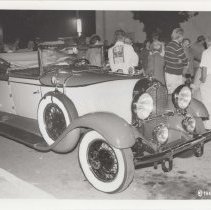 Black and white photo of a 1928-1930 Auburn cabriolet taken at night