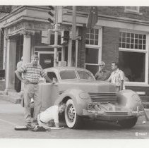 Black and white photo of a group of ACD Club members doing maintenance