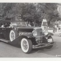 Black and white photo of a 1935 Duesenberg Model SJ-582 torpedo phaeton