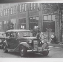 Two ACD cars in front of the Auburn Cord Duesenberg Automobile Museum