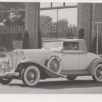 1931 Auburn cabriolet in the parking lot of the museum