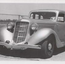 1936 Auburn 654 sedan in a parking lot