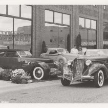 1936 Auburn 852 cabriolet and a Cord 810 phaeton in front of the museum