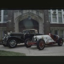 Duesenbergs in front of Eckhart Hall building