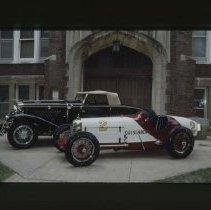 Duesenbergs in front of Eckhart Hall building