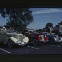 1935 - 1936 Auburn Cabriolets next a Cord 810 - 812