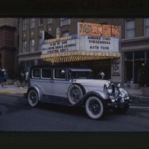 Auburn 1928 - 1930 Sedan in front of Paramount Movie Theatre
