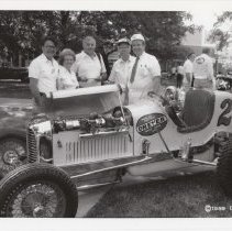 Group beside the 'Worlds Fastest Dreyer Half Mile Car'