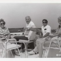 Four people on a boat