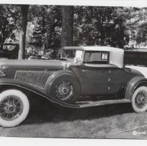 1933 Auburn V-12 cabriolet in front of Aurora University