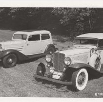 1934 Auburn brougham and a 1931 Auburn phaeton in a park