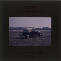 Black Rolls-Royce with cream top