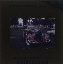 Brown Packard with the sedan body style