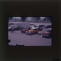 A parking lot with non-ACD cars