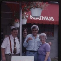 Four people in front of NATMUS