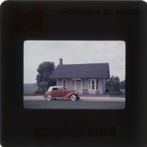 1934 Auburn Phaeton in front of the Bus Depot