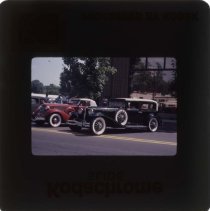 1931 Auburn Sedan and a 1935 or 1936 Auburn Cabriolet in front of the museum