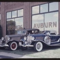 1933 Auburn Brougham and a 1931 Auburn Speedster in front of the museum