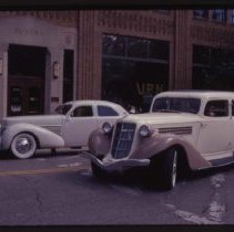 1936 Auburn 654 Brougham and a Cord 810-812 Sedan in front of the museum