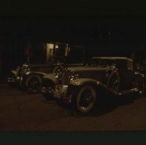 1929 - 1931 Cord L - 29 Cabriolet and other Cord L - 29 driving down downtown Auburn