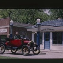 1914 Ford Model T in front of the Sun Oil Company