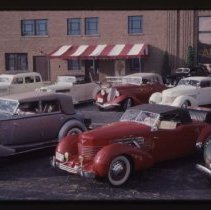 1935 or 1936 Auburn Sedan and Cord 810-812 Cabriolet in front of the museum