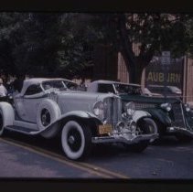 1931 Auburn Speedster and a 1935 or 1936 Auburn Cabriolet in front of the museum