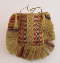 Kete, square with strap made of plaited flax.
