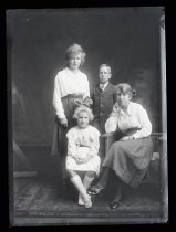 Cooney, woman and three children