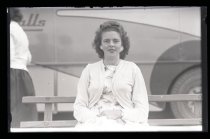 Young woman sitting on a bench