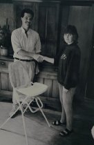 Darryl Brown and Diane Rogers shaking hands