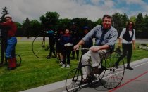David Owen riding tricycle