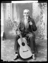 Don Jose della Rosa with guitar